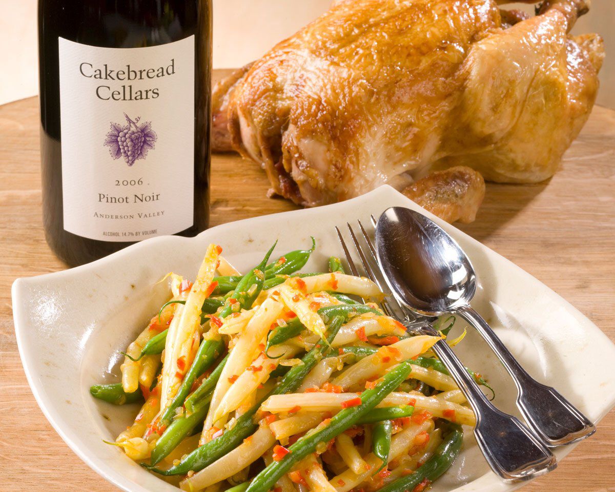 Summer Bush Beans with Red Pepper Soffrito served with roasted chicken and a bottle of Cakebread Cellars Pinot Noir.